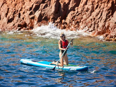 Stand-up paddleboarding near the Lerins Islands during the Cannes catamaran cruise