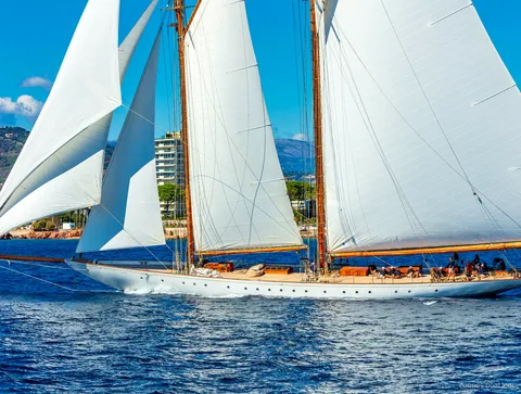 Guests enjoying Champagne on the Cannes Royal Regatta catamaran cruise